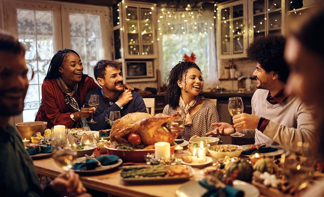 thanksgiving dinner with people around table
