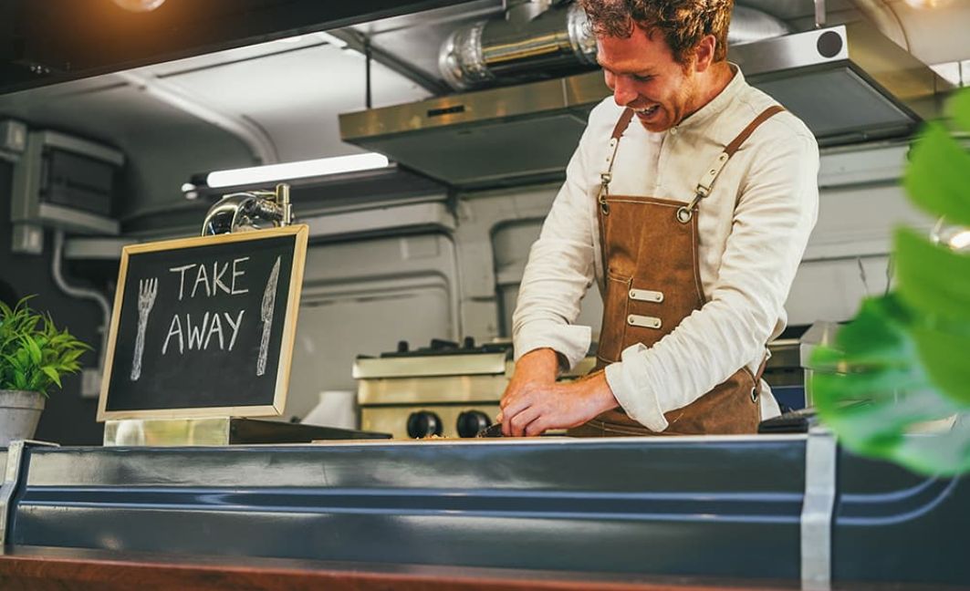 food truck owner making order