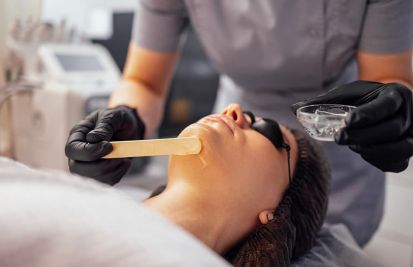 beautician working with woman