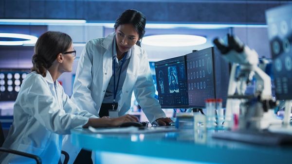 integrated payment for healthcare doctors reviewing test results