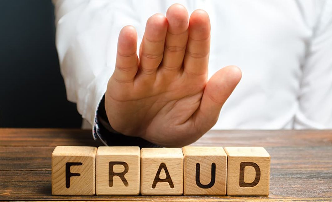 fighting fraud with hand