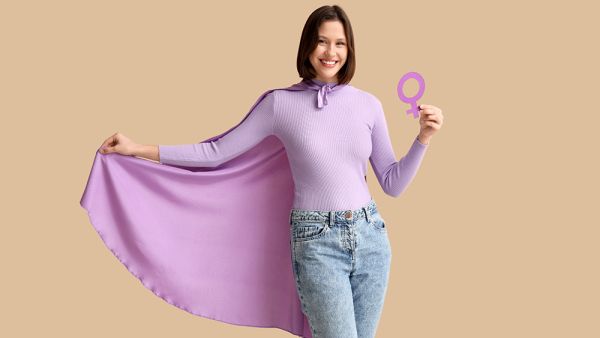 international womens day female in a purple cape