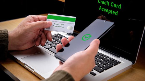 Best way to Accept Credit Cards man on mobile and laptop device