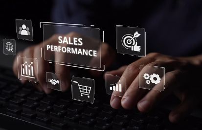 Man on laptop tracking key metrics on ecommerce store like sales performance