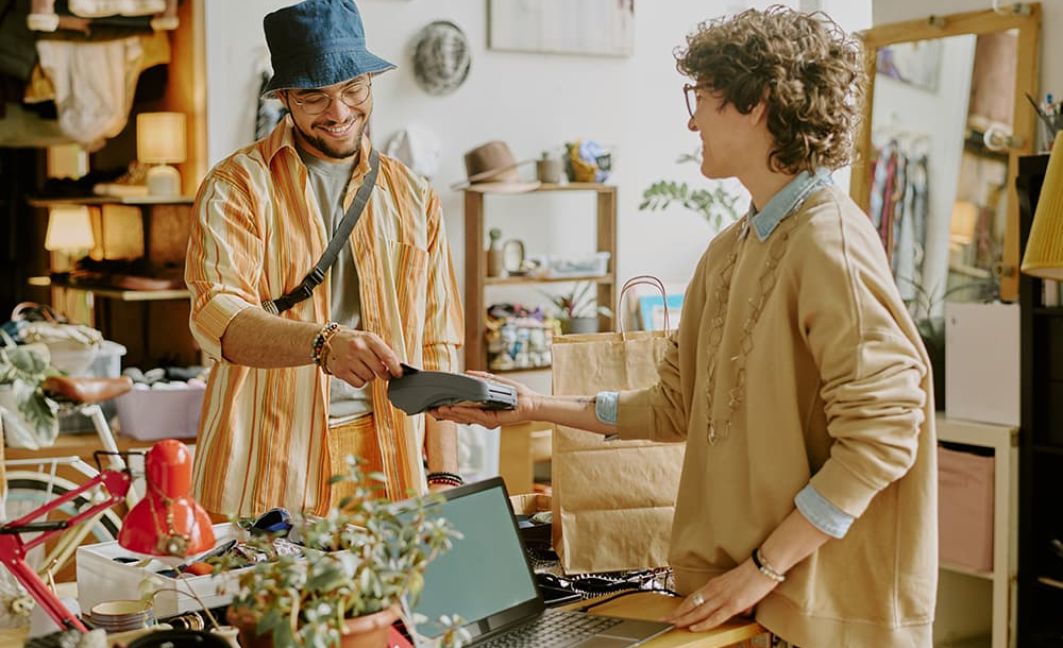 Customer making payment at retail store