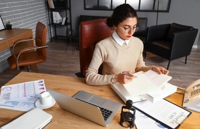 Female notary public working in office