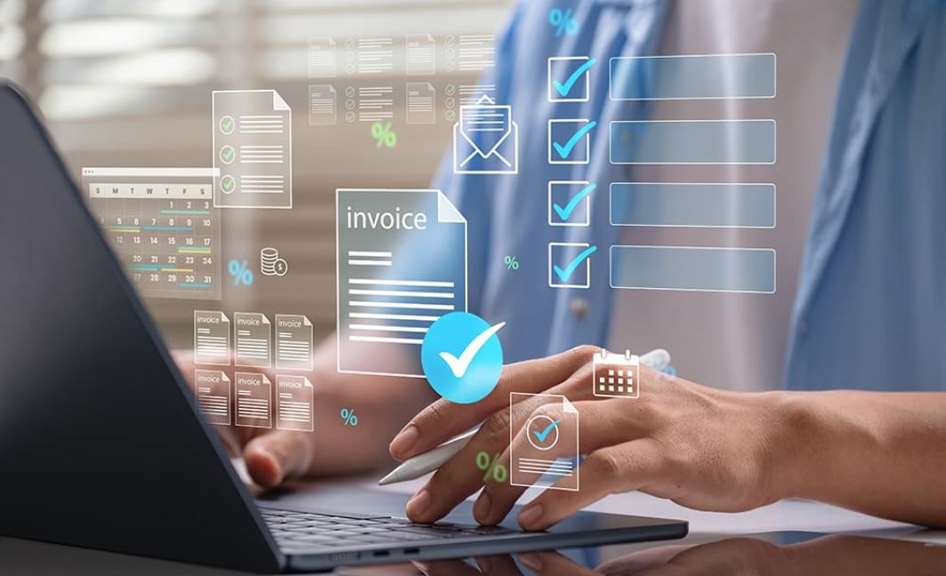 invoices for a payment app with man on laptop