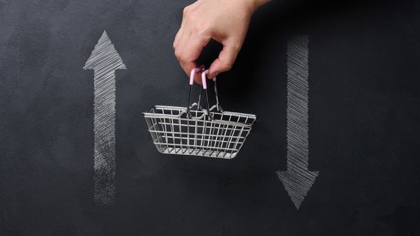 less cash shopper with basket in hand