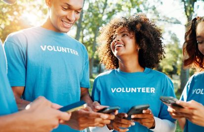 volunteers using mobile terminals and fundraising