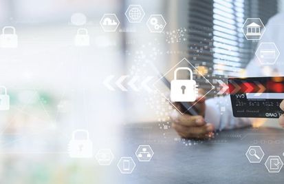 Man holding credit card with technological features