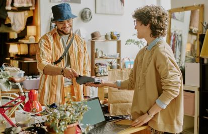 Customer making payment at retail store