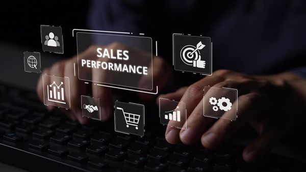 Man on laptop tracking key metrics on ecommerce store like sales performance