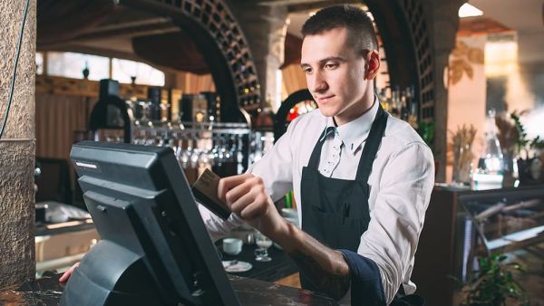 Mobile Card Readers being used by coffee barista