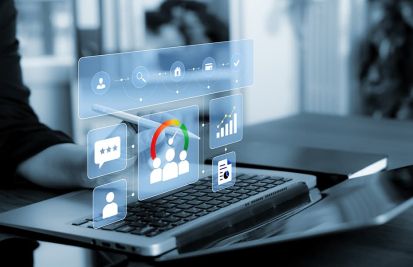 Man on laptop working with business analytics information