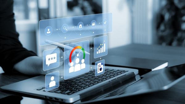 Man on laptop working with business analytics information