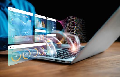 Man on laptop using innovation to be more efficient for business