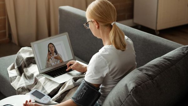 woman on telemedicine call with doctor