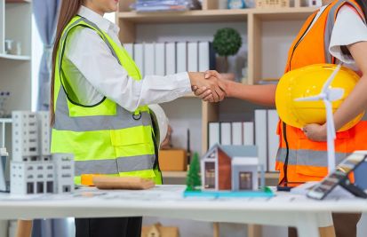 contractor shaking hands for phased billing