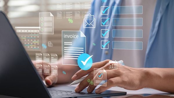 invoices for a payment app with man on laptop