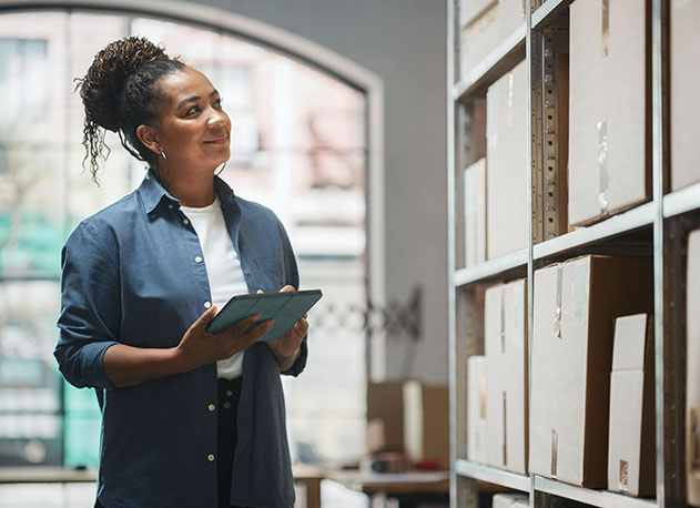 A CBD store owner doing inventory management with the help of North POS systems