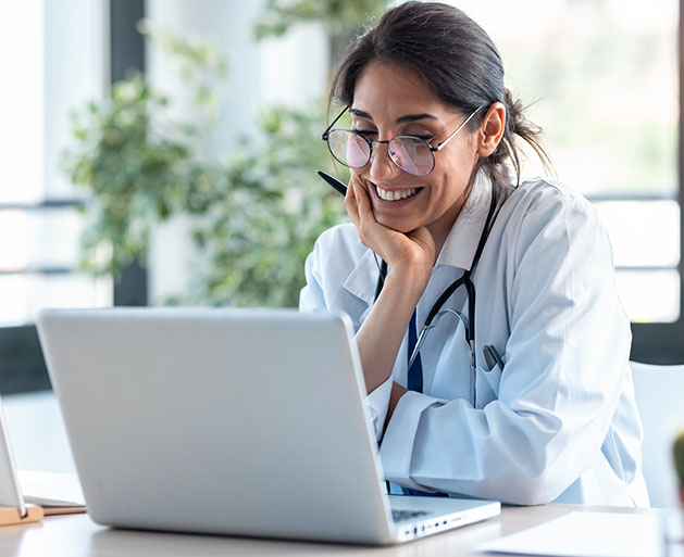 A female healthcare professional on a virtual visit with a patient
