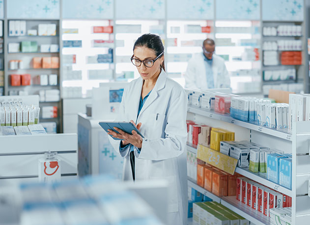 A pharmacist taking inventory using North's inventory management systems