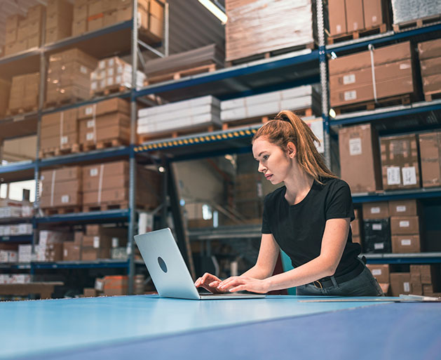 A warehouse worker using North's POS inventory management systems 