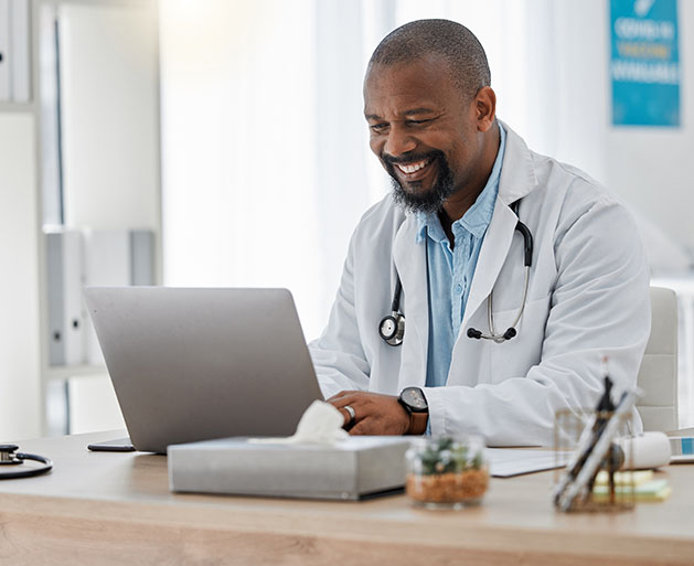 A doctor reviewing telemedicine reports using North POS software 